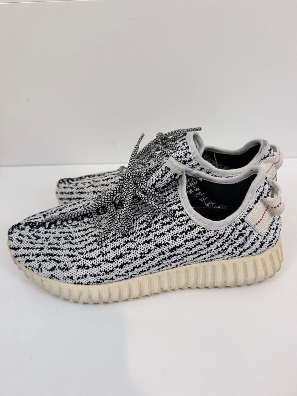 Yeezy black and white sneakers sz 7.5